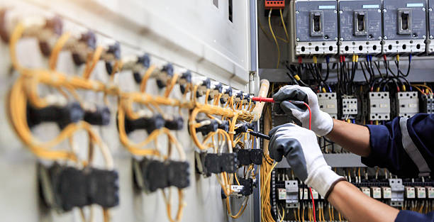 Professional Electrician technician working in Bright, IN